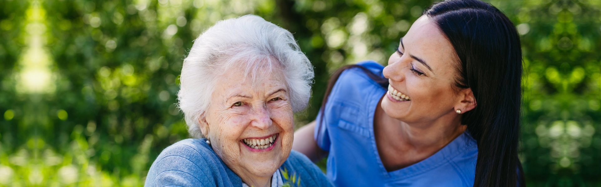 caregiver and senior smiling