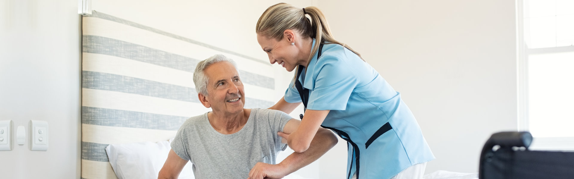 caregiver assisting senior